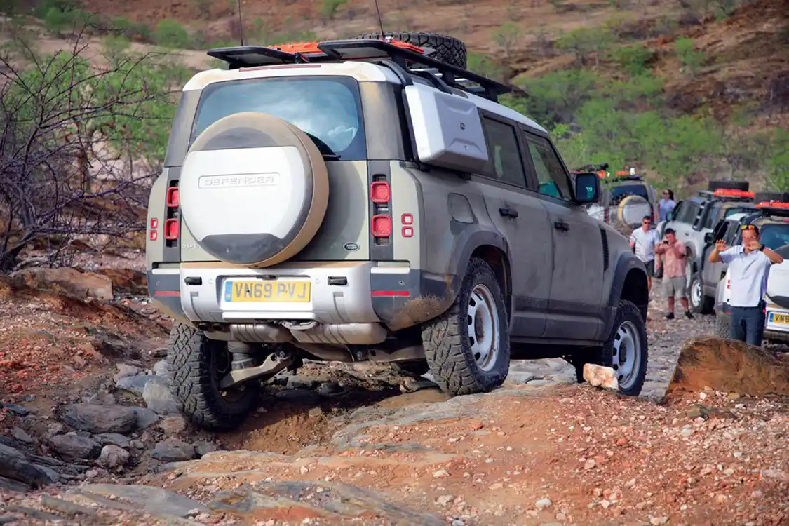 Land Rover Defender rock crawling in Africa