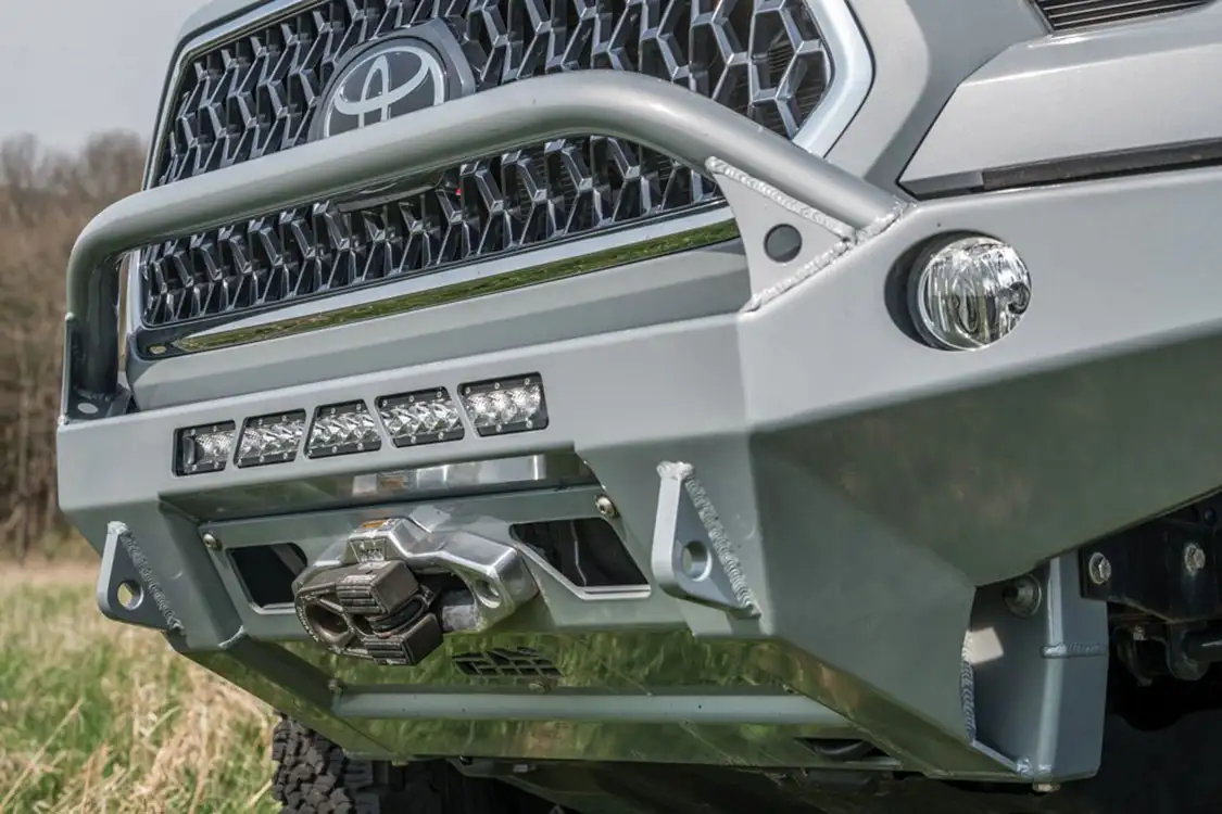 CBI front bumper, recovery points, light mounts, and a Warn winch mount CBI front bumper, recovery points, light mounts, and a Warn winch mount