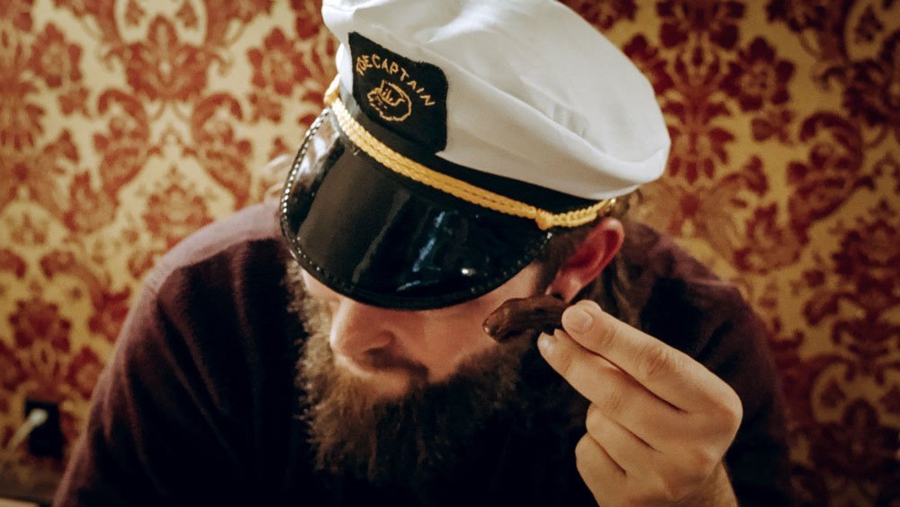 The Captain prepares us for the Sourtoe Cocktail in Dawson City, Yukon.