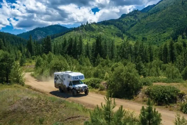 Nitro Gear Ultimate Adventure RV driving along a remote road