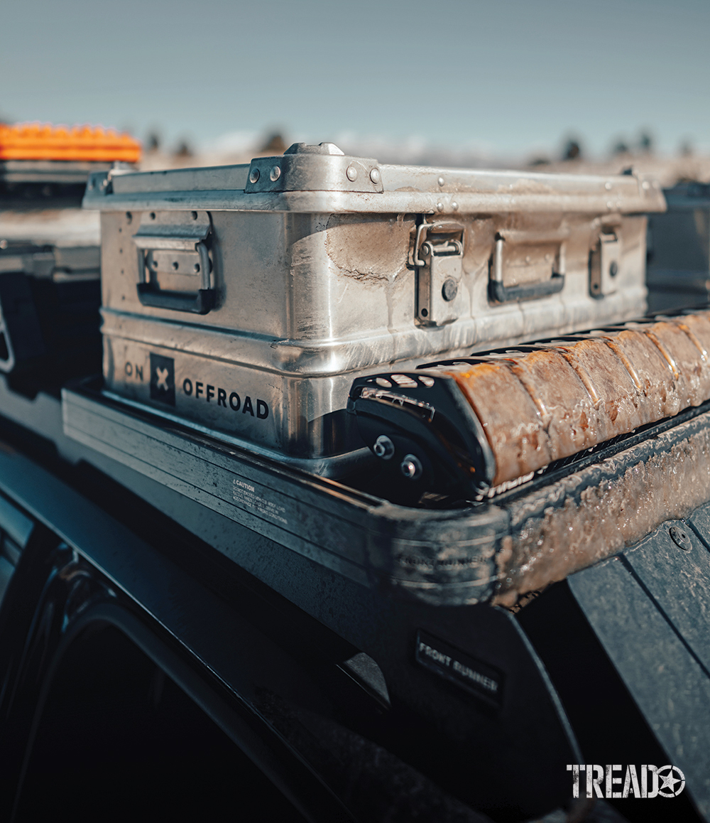 Tucked behind an ice-covered Front Runner roof rack and Rigid Adapt lightbar, the A042 Aluboxes provide extra storage up top for recovery gear and other necessities.