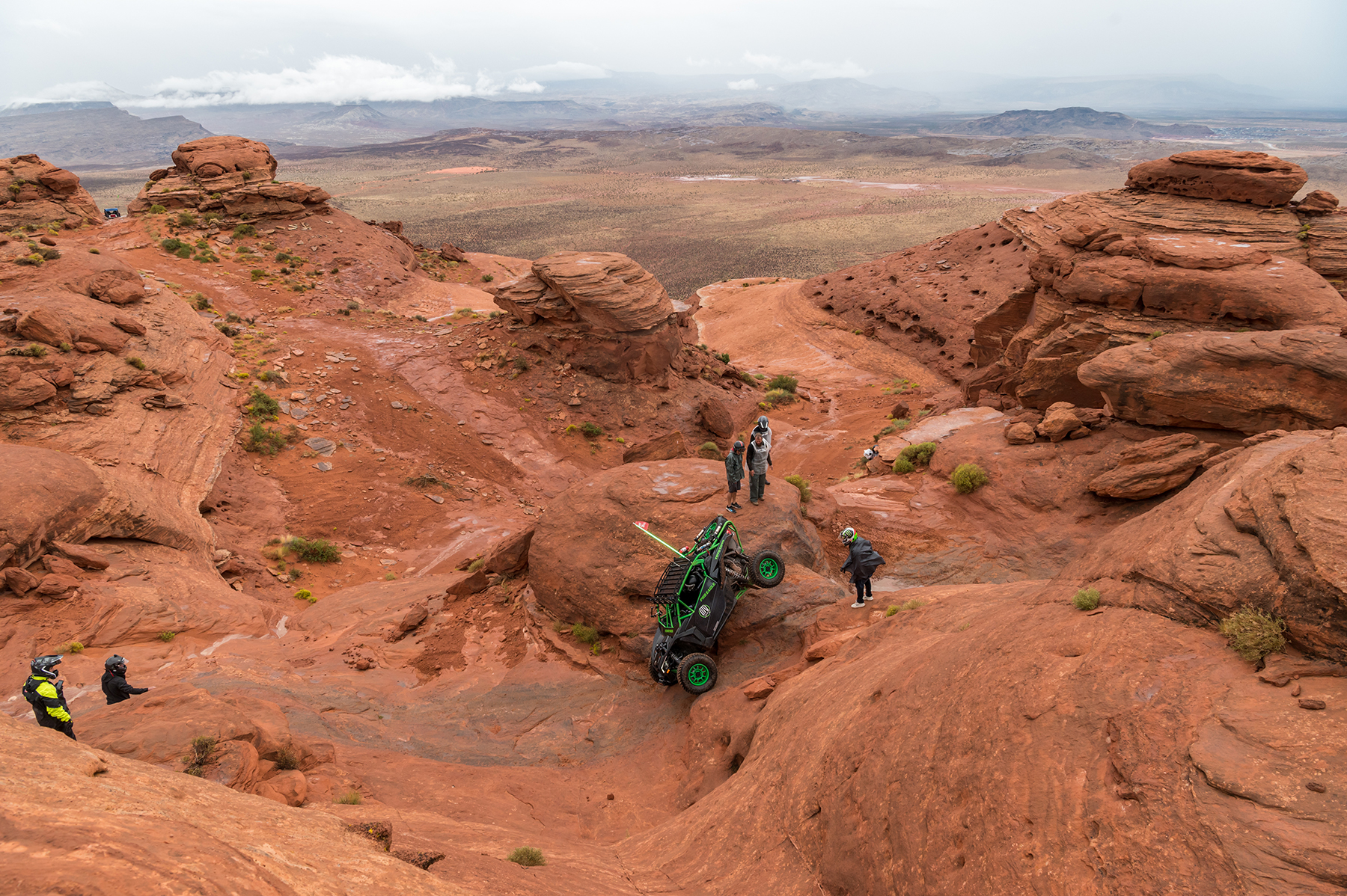 Can-Am drives up steep slippery rocks at International Off Road Day in Sand Hollow State Park at Trail Hero.