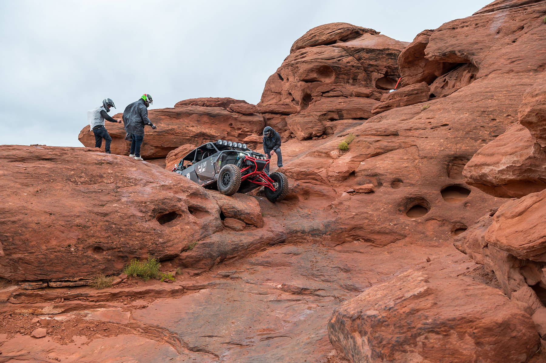 Can-Am drives up steep slippery rocks at International Off Road Day in Sand Hollow State Park at Trail Hero.