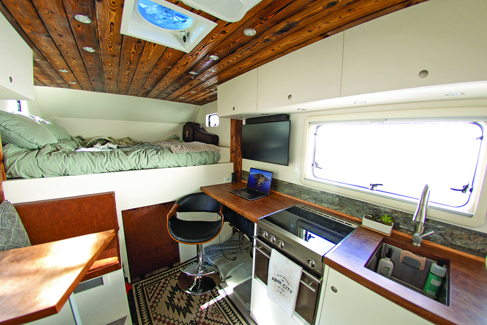 The MUSEROAMER’s living area, complete with a desk space. 