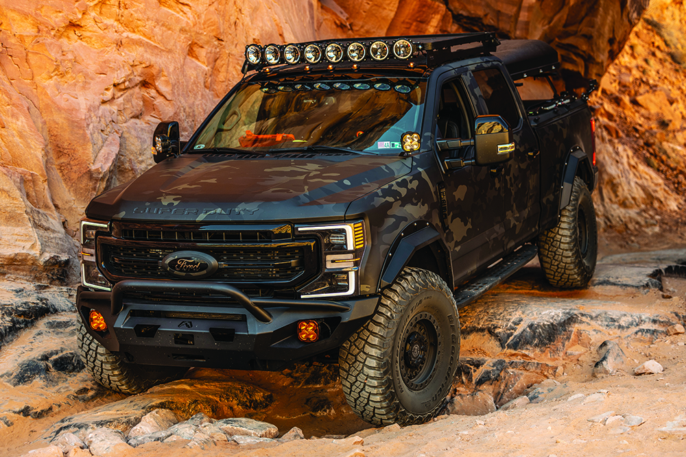 The black F250 Tremor tackles downhill terrain.