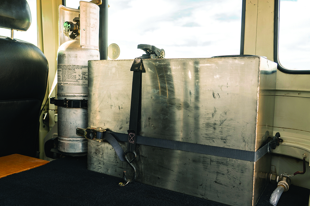 Fifteen gallon water tank, six-pound Worthington aluminum propane tank.