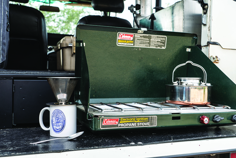 Propane tank feeds stove on the FJ40's drop-down tailgate.