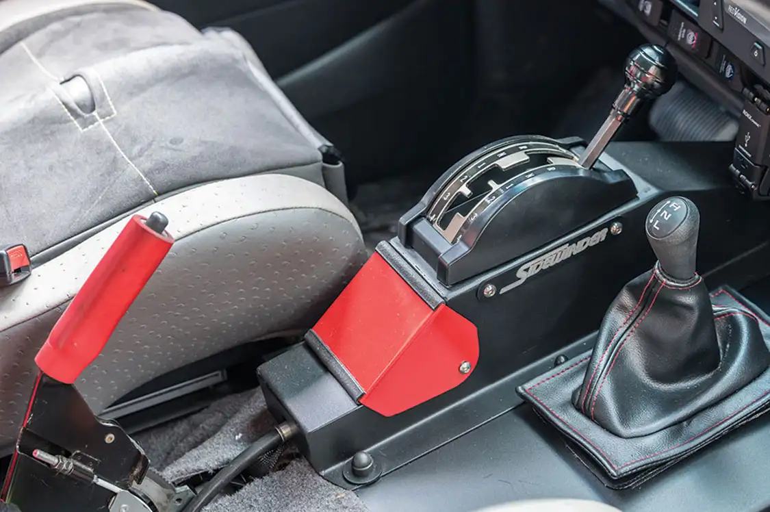 The custom shifter console with Winter’s Artcar gated shifter stands.