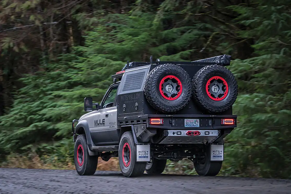 Having two spare tires mounted on the canopy