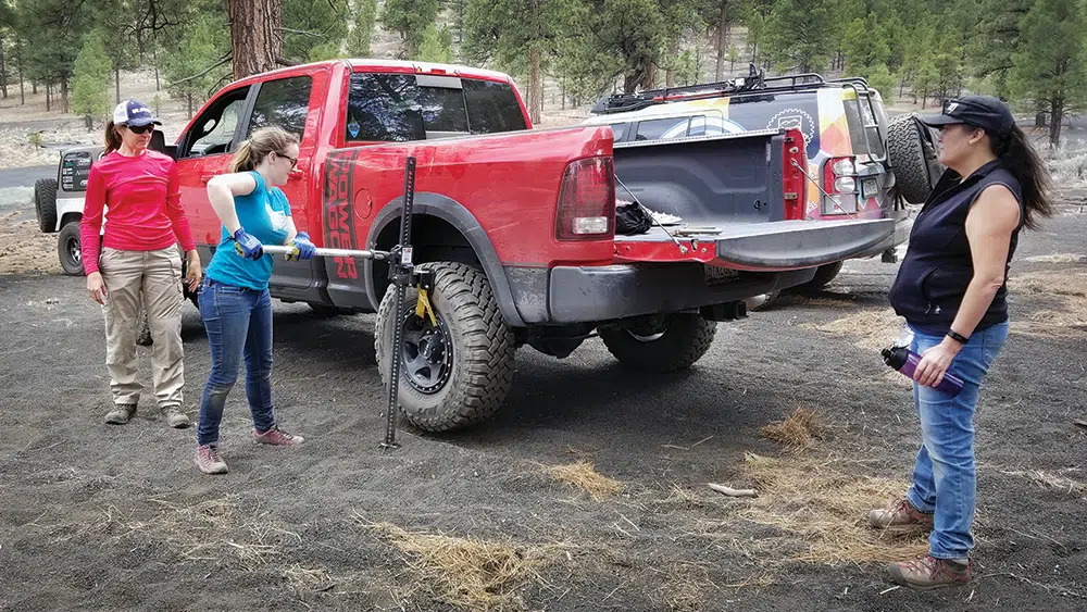Nena Barlow helps a training attendee learn how to use a Hi-Lift jack in a safe environment