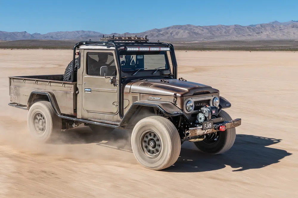 Twins have plenty of practice kicking up dust in their FJ49