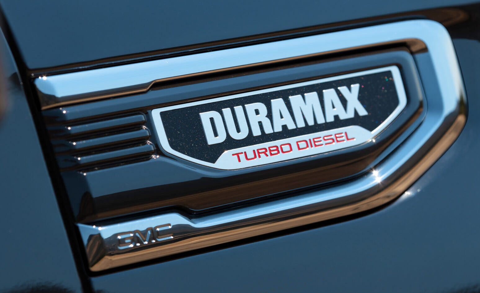 Close-up of 3.0L Duramax Turbo-Diesel engine badge on the 2024 GMC Sierra 1500.