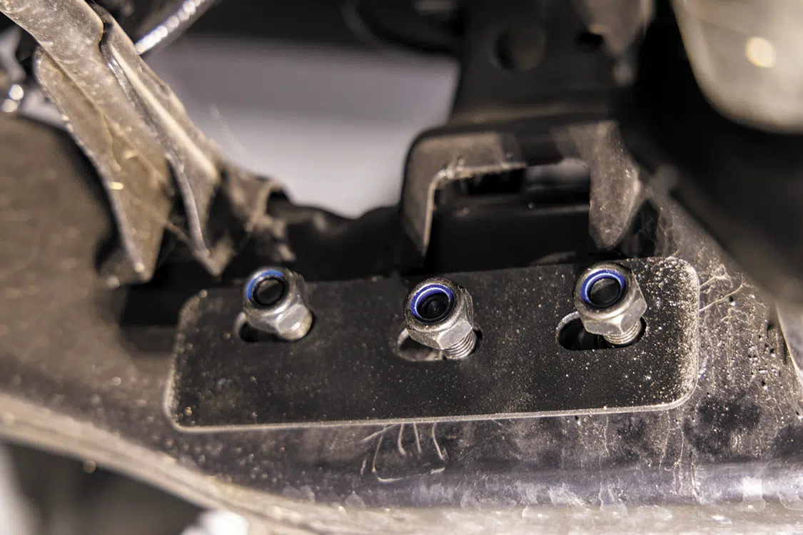 Each side of the frame has three bolt holes