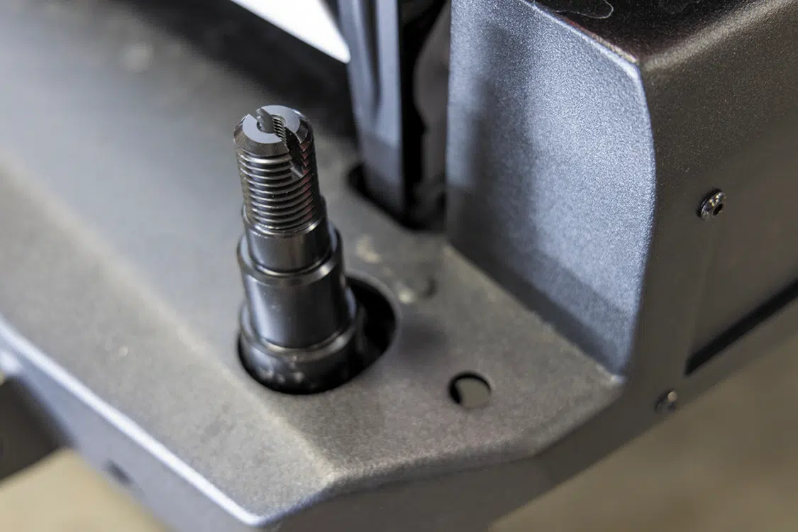 Install the swing arm mounts on the bumper