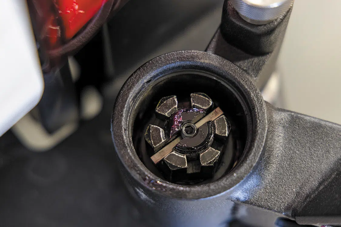 Tighten the castle nut and install the key