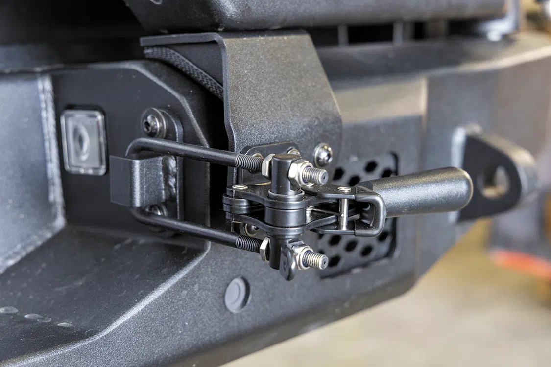 Install the latch on the swing arm