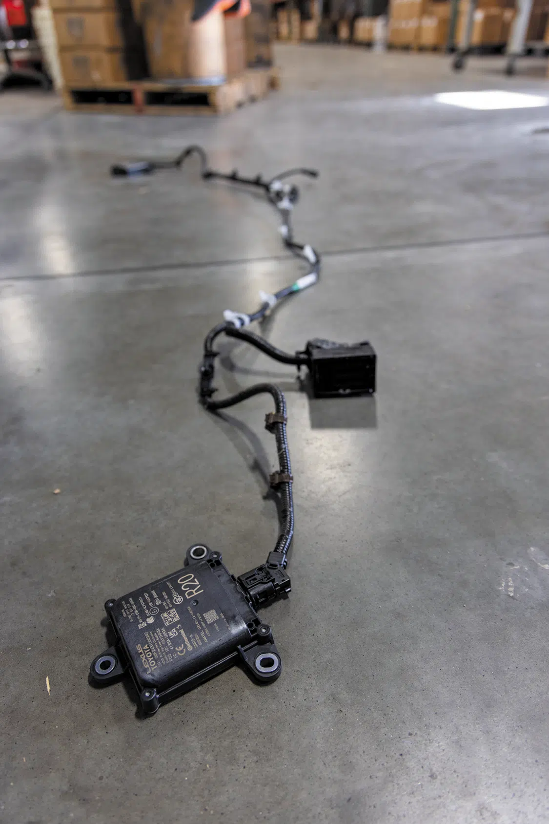 Remove the wiring harness from the factory rear bumper