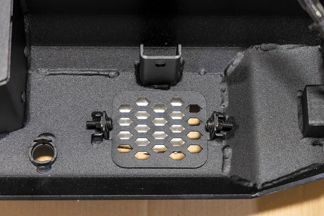 Install the provided block-off plate on the bumper